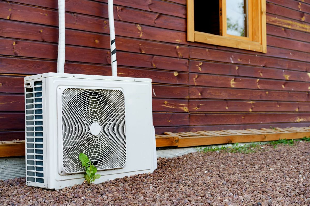 Heat pump installed outside a Suffolk County home